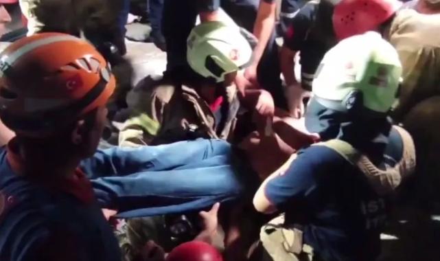 Düşen telefonunu alırken kayalıklara sıkıştı!