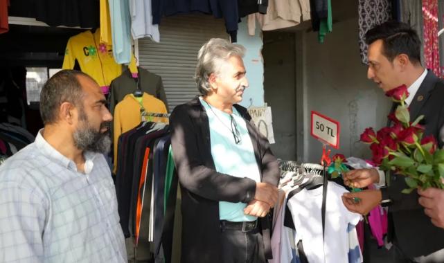 MHP’den kadına şiddete dikkat: Erkeklere gül dağıtıldı