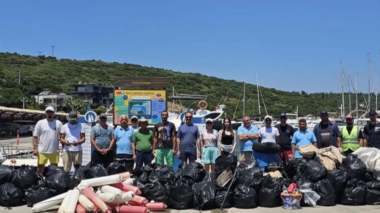 Sığacık koylarında yıllardır sessiz sedasız temizlik yapıyorlar